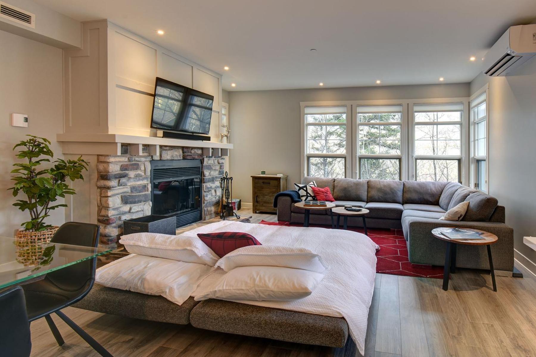 Апартаменты Tremblant Prestige - Les Eaux 207-2 Мон-Трамблан Экстерьер фото